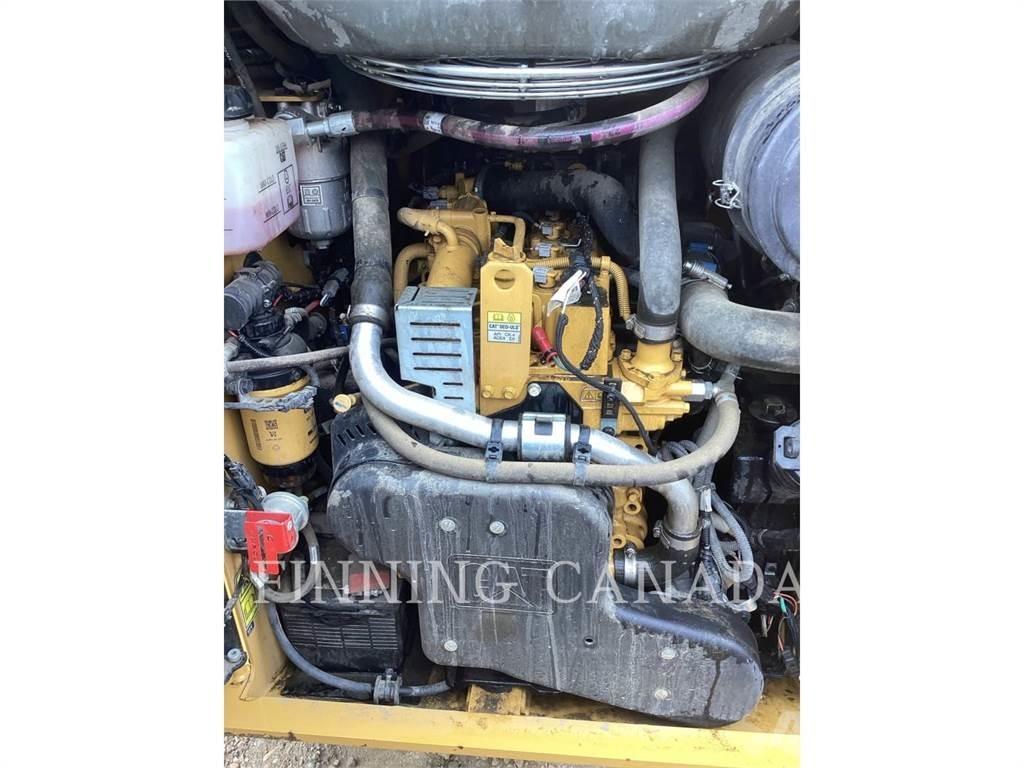 CAT 259D3 Beltelastere