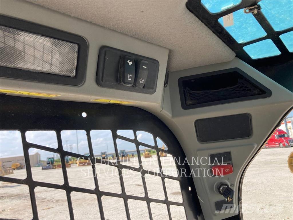 CAT 259D3 Beltelastere