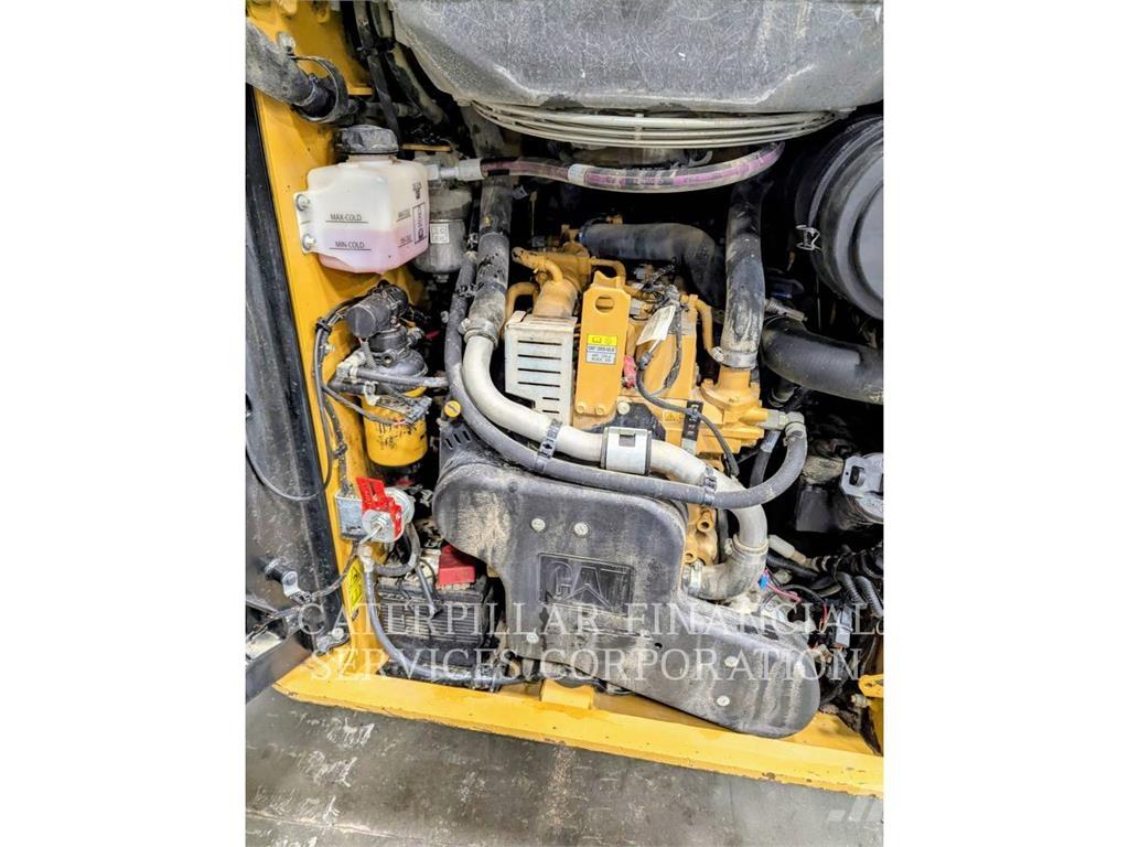 CAT 259D3 Beltelastere