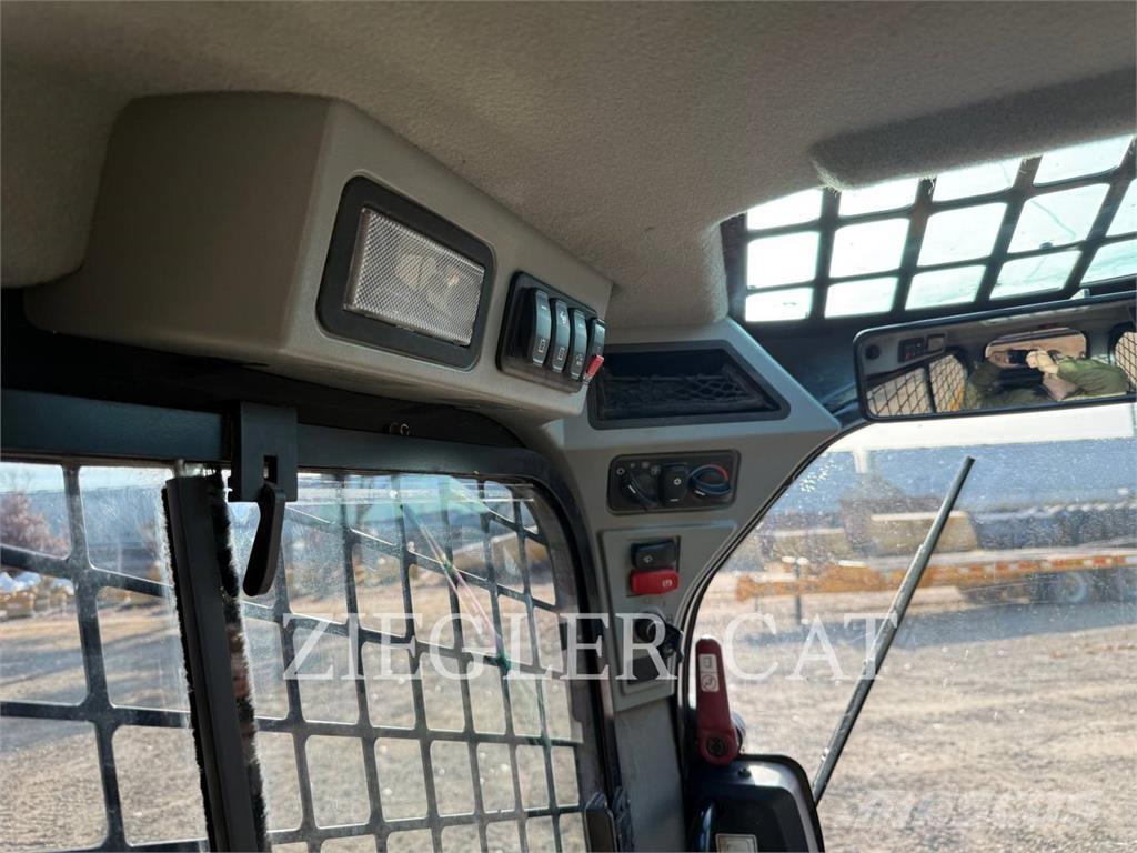 CAT 259D3 Beltelastere