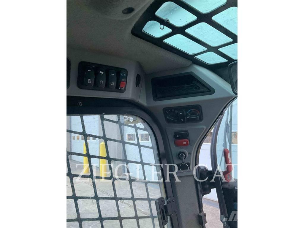 CAT 259D3 Beltelastere