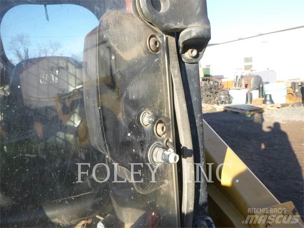 CAT 279D Beltelastere