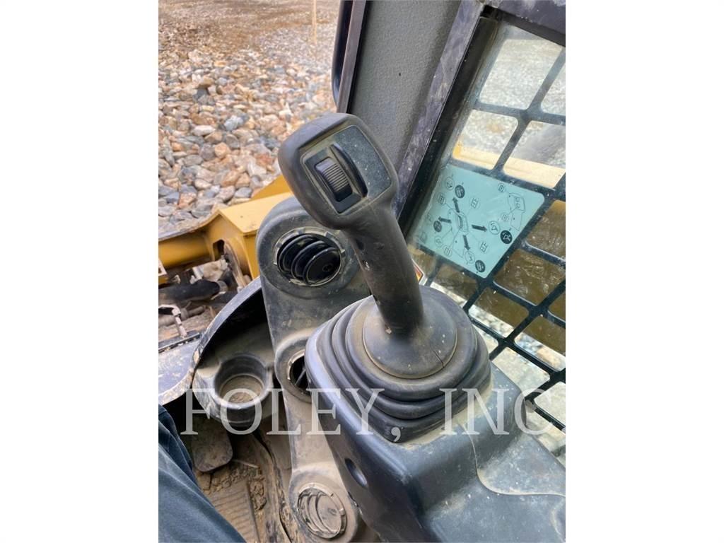 CAT 279D Beltelastere