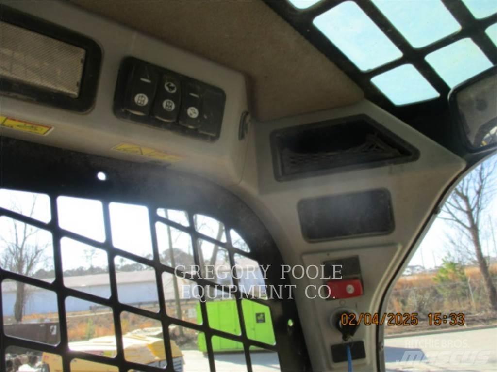 CAT 279D Beltelastere