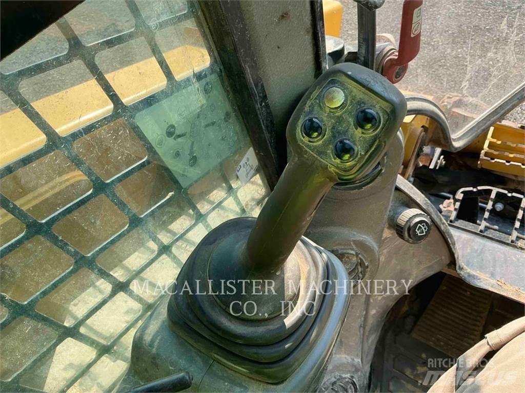 CAT 279D Beltelastere