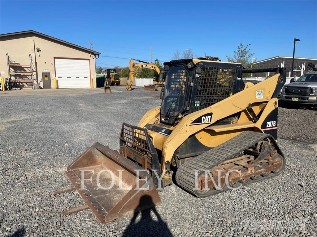 CAT 287B Beltelastere