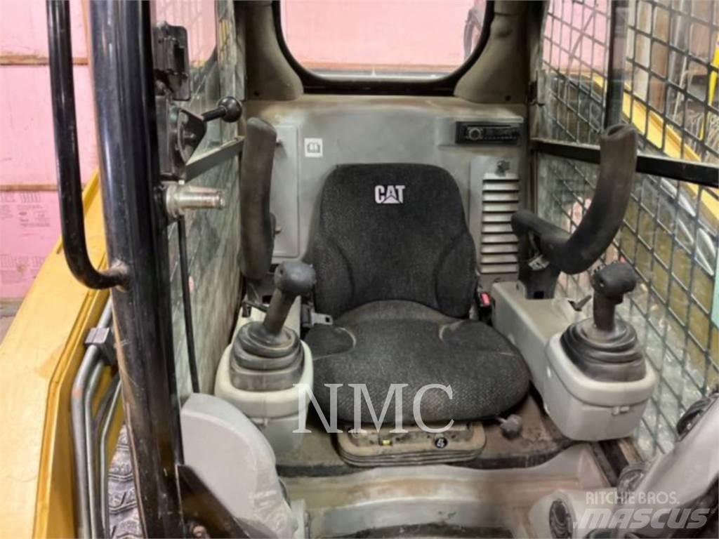 CAT 289C Beltelastere