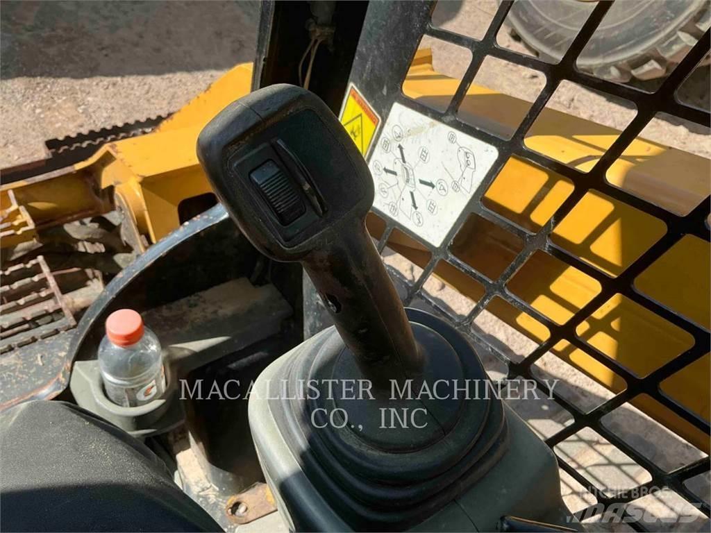 CAT 289D Beltelastere