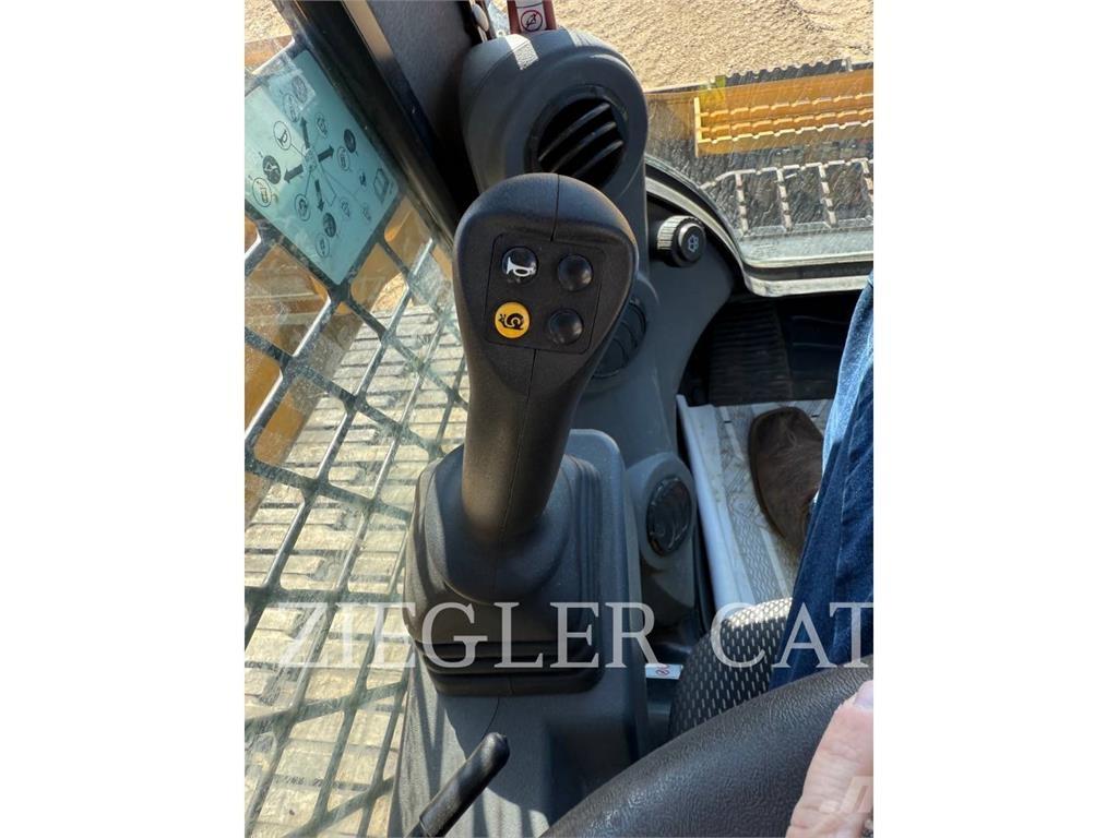 CAT 289D3 Beltelastere