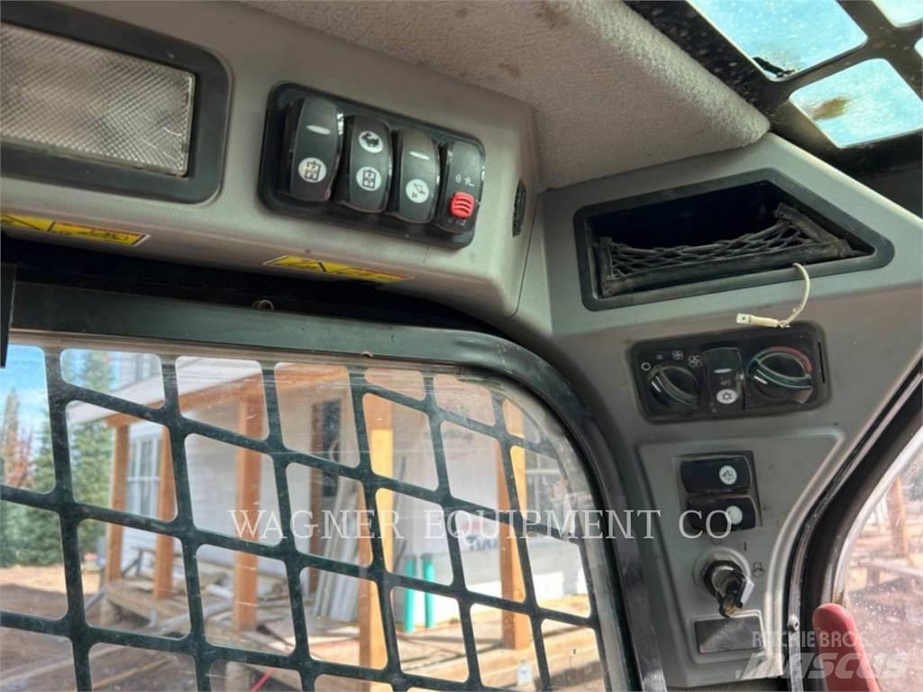 CAT 299D2 Beltelastere