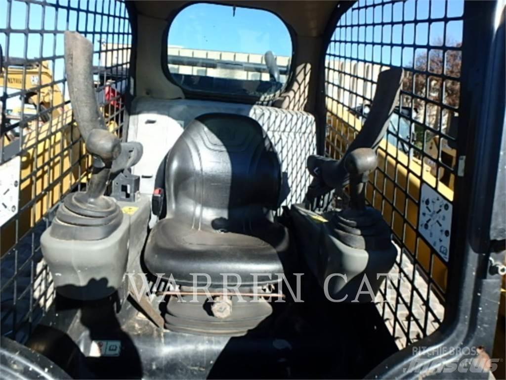 CAT 299D2 Beltelastere