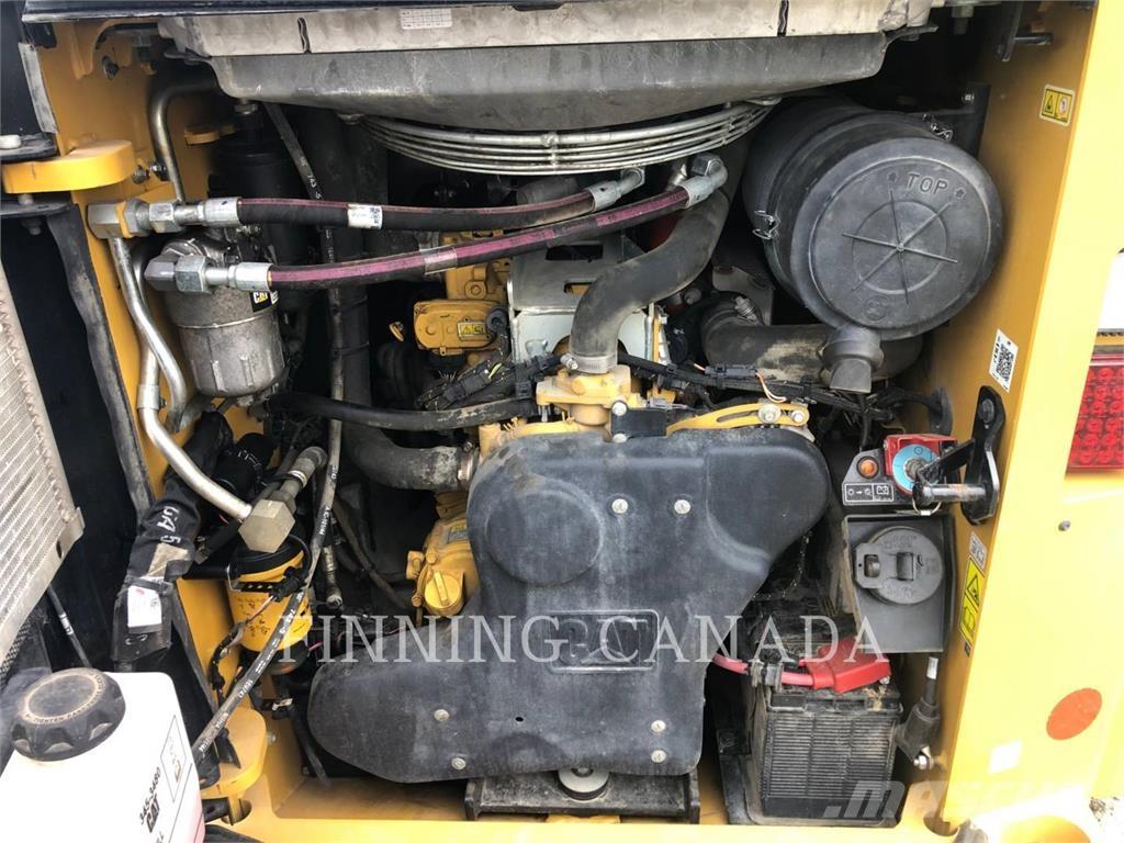 CAT 299D3 XE Beltelastere