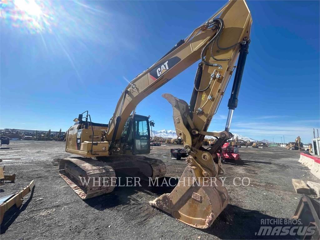 CAT 320 TH Beltegraver