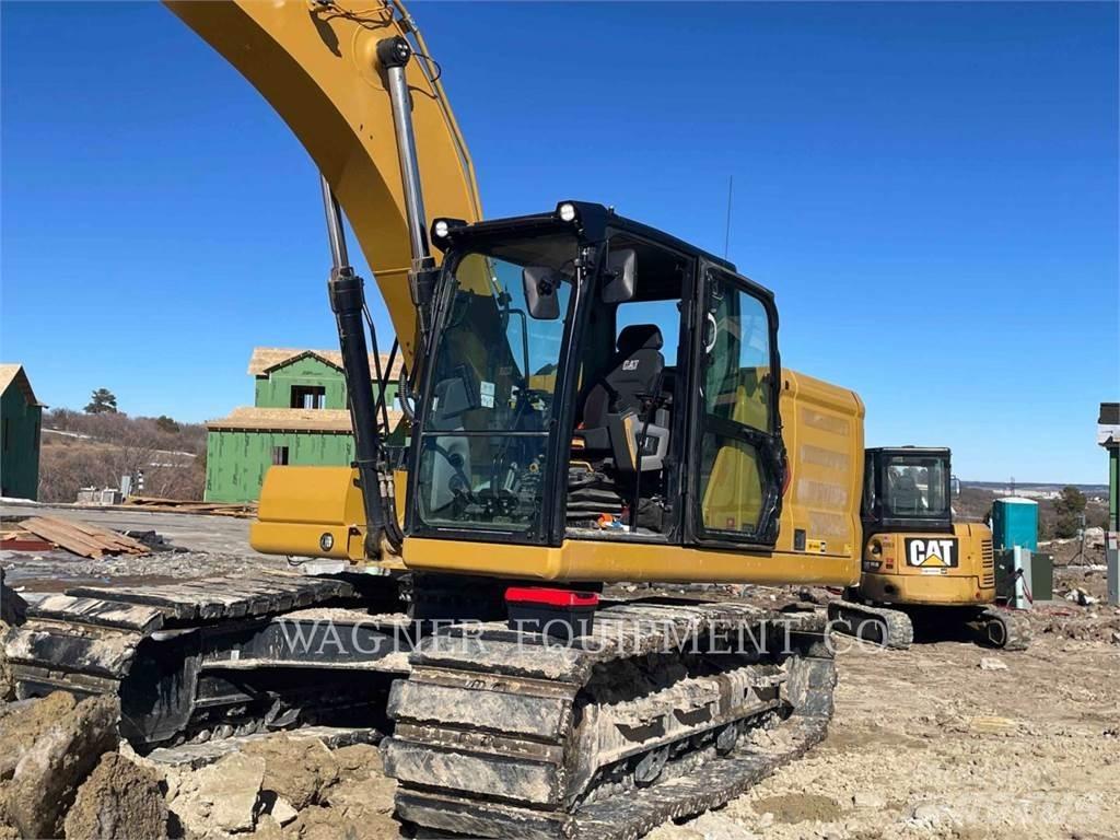 CAT 323 Beltegraver