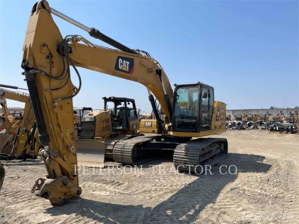 CAT 323 Beltegraver