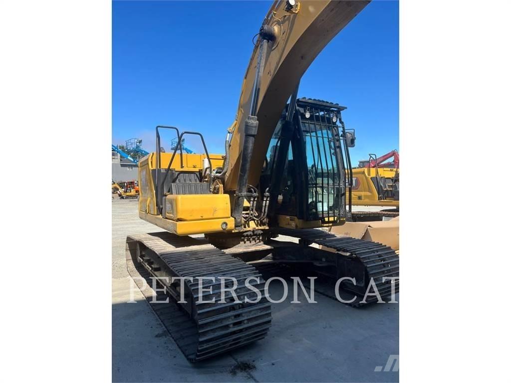 CAT 323 Beltegraver