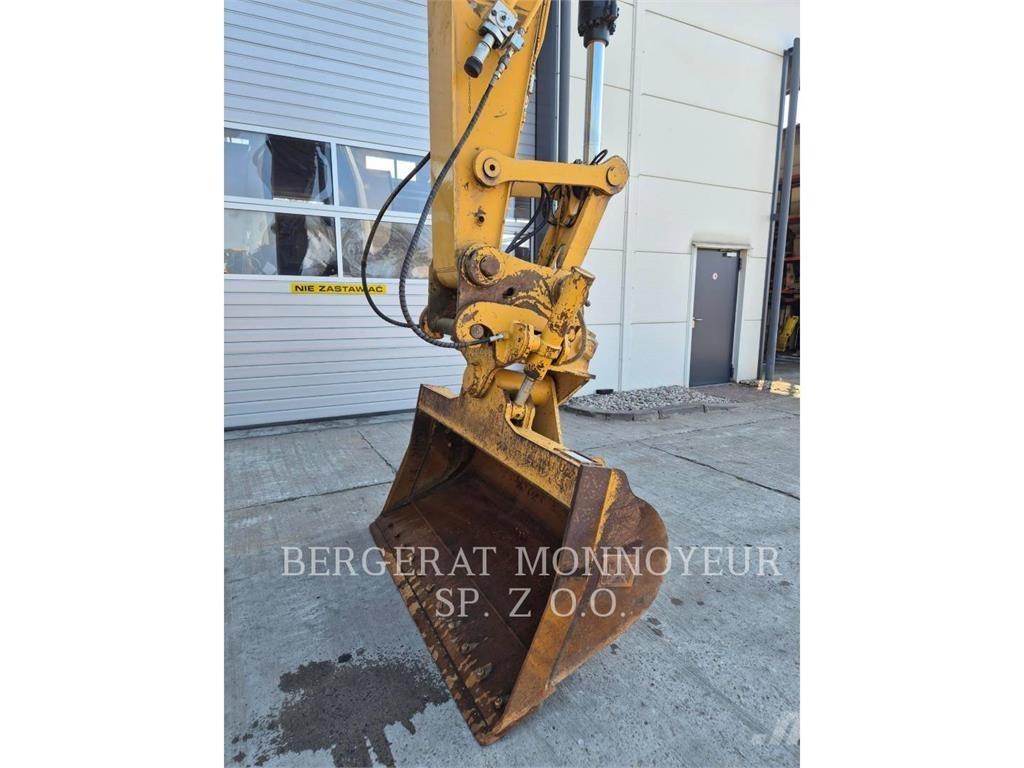 CAT 323 Beltegraver