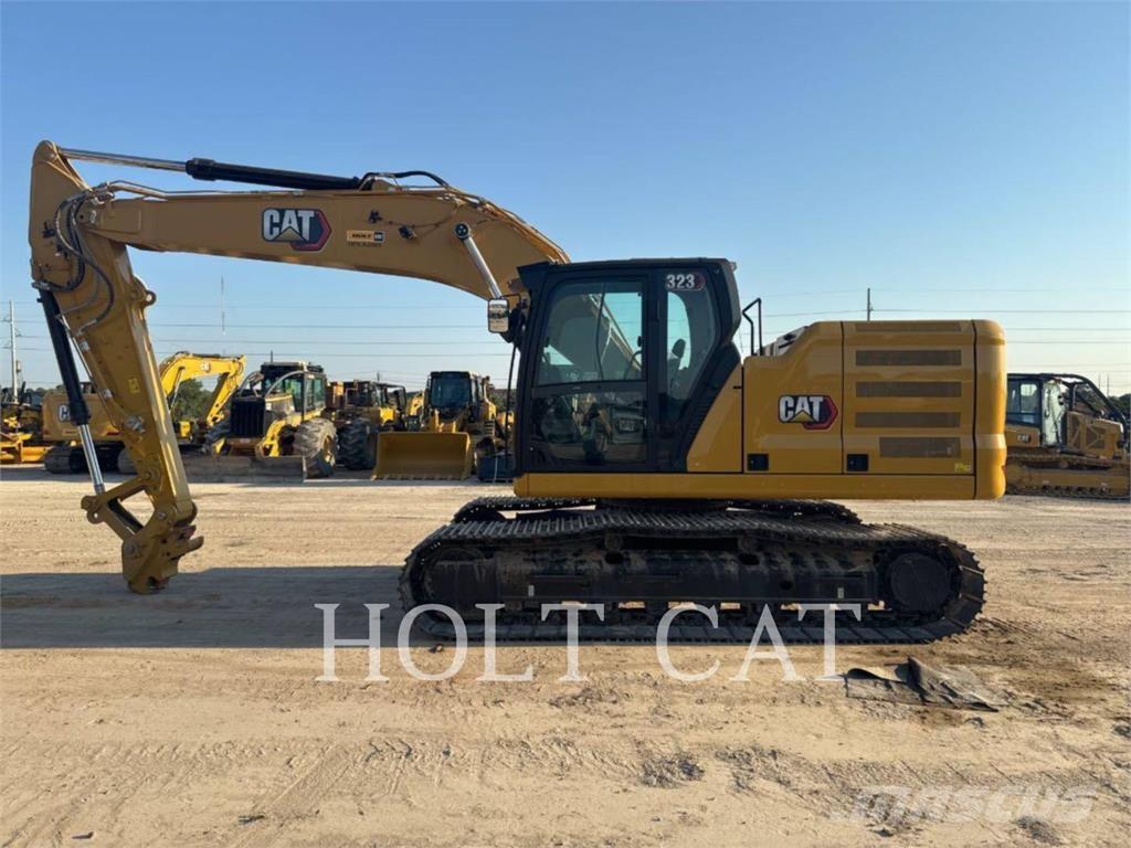 CAT 323 TC Hjullastere
