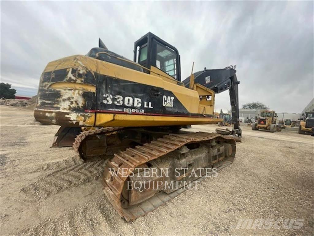 CAT 330B FM Traktor med skogsutstyr