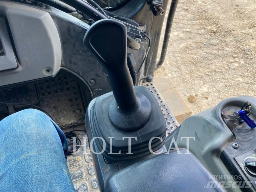 CAT 973K Beltelastere