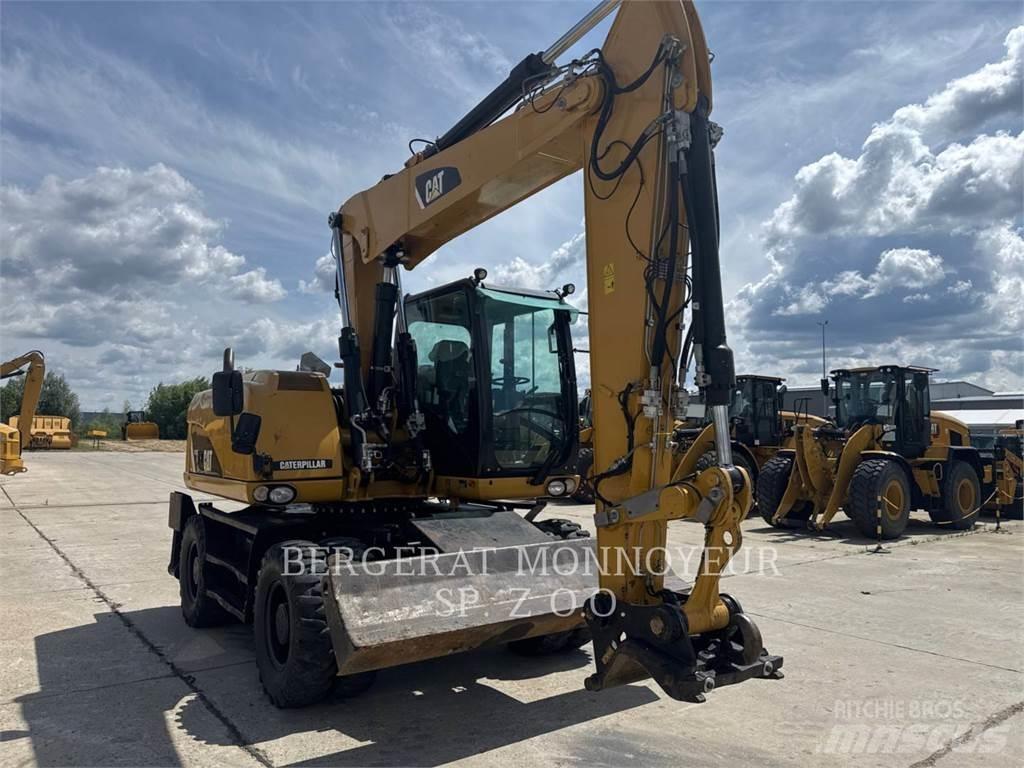 CAT M313D Hjulgravere