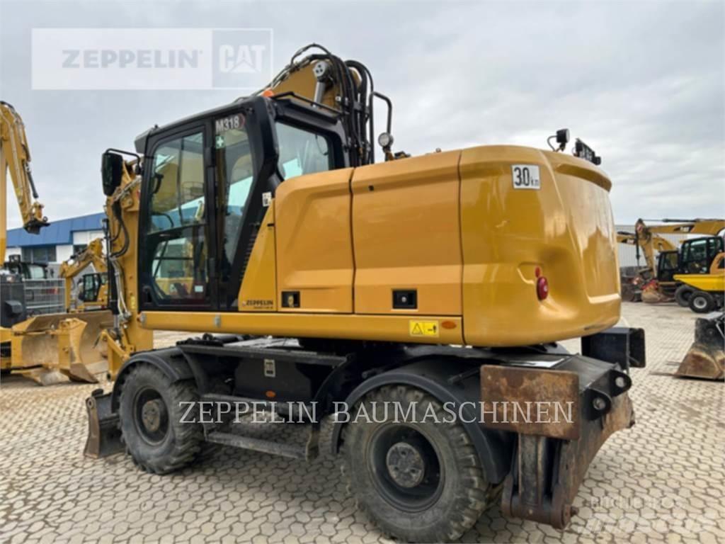 CAT M318-07A Hjulgravere