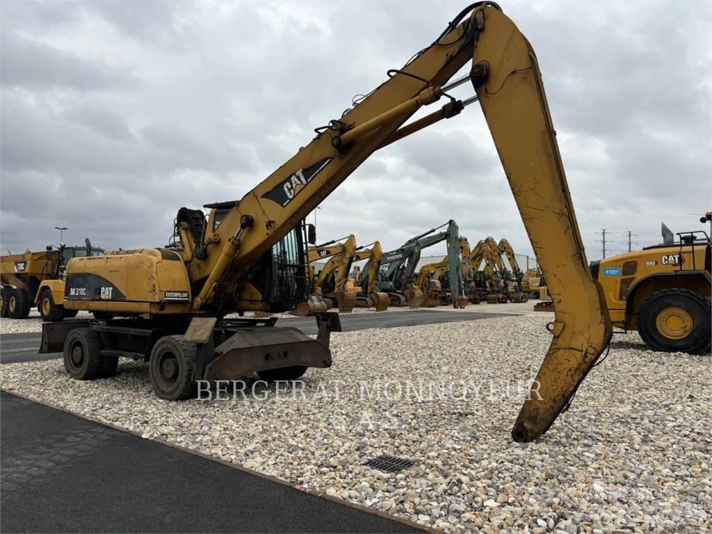 CAT M318C Hjulgravere