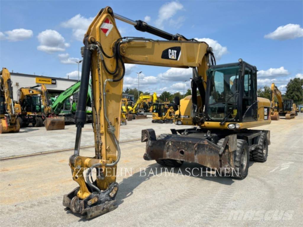 CAT M318D Hjulgravere