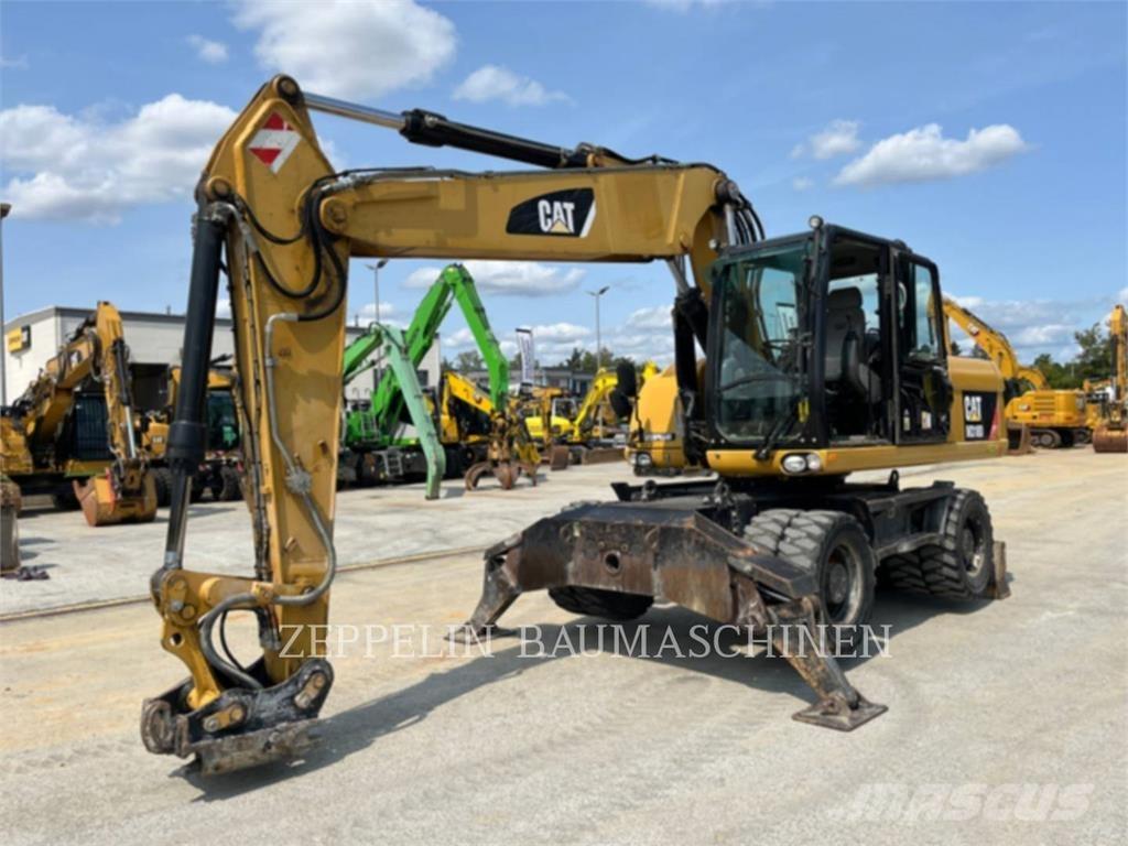 CAT M318D Hjulgravere