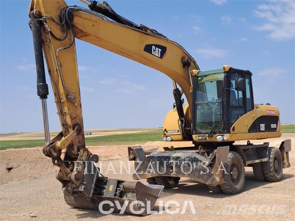 CAT M318D Hjulgravere