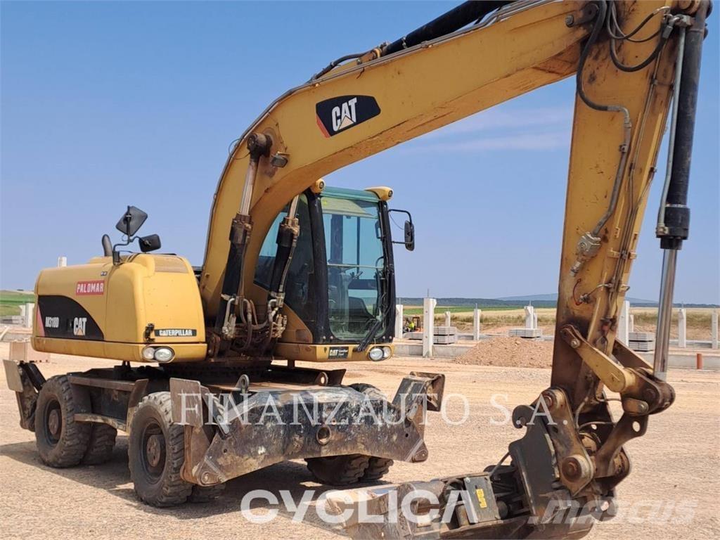 CAT M318D Hjulgravere