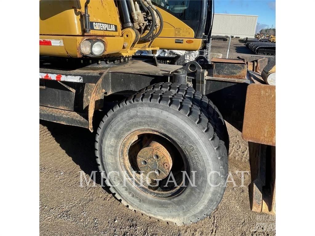 CAT M318D PM Hjulgravere