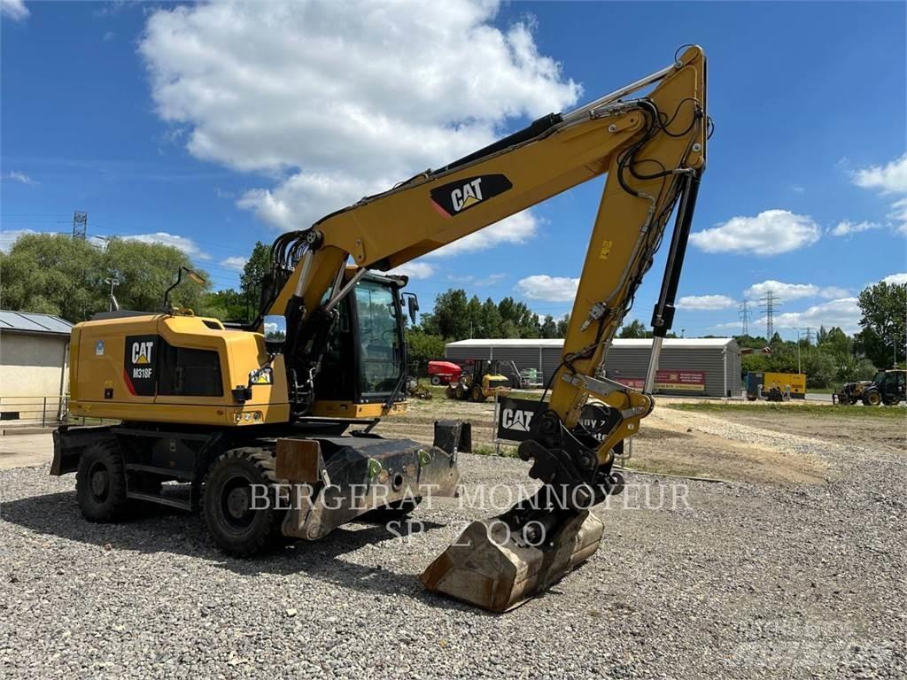 CAT M318F Hjulgravere