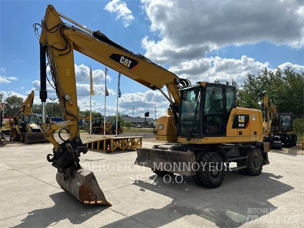 CAT M318F Hjulgravere