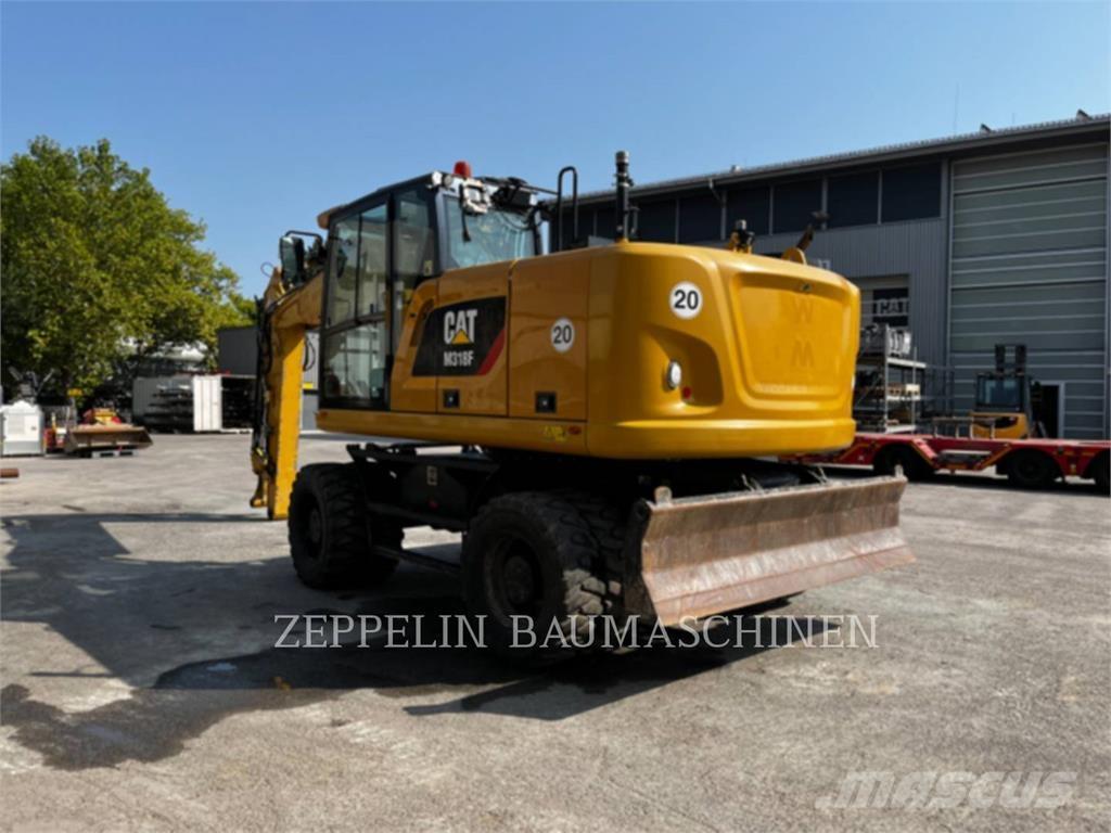CAT M318F Hjulgravere