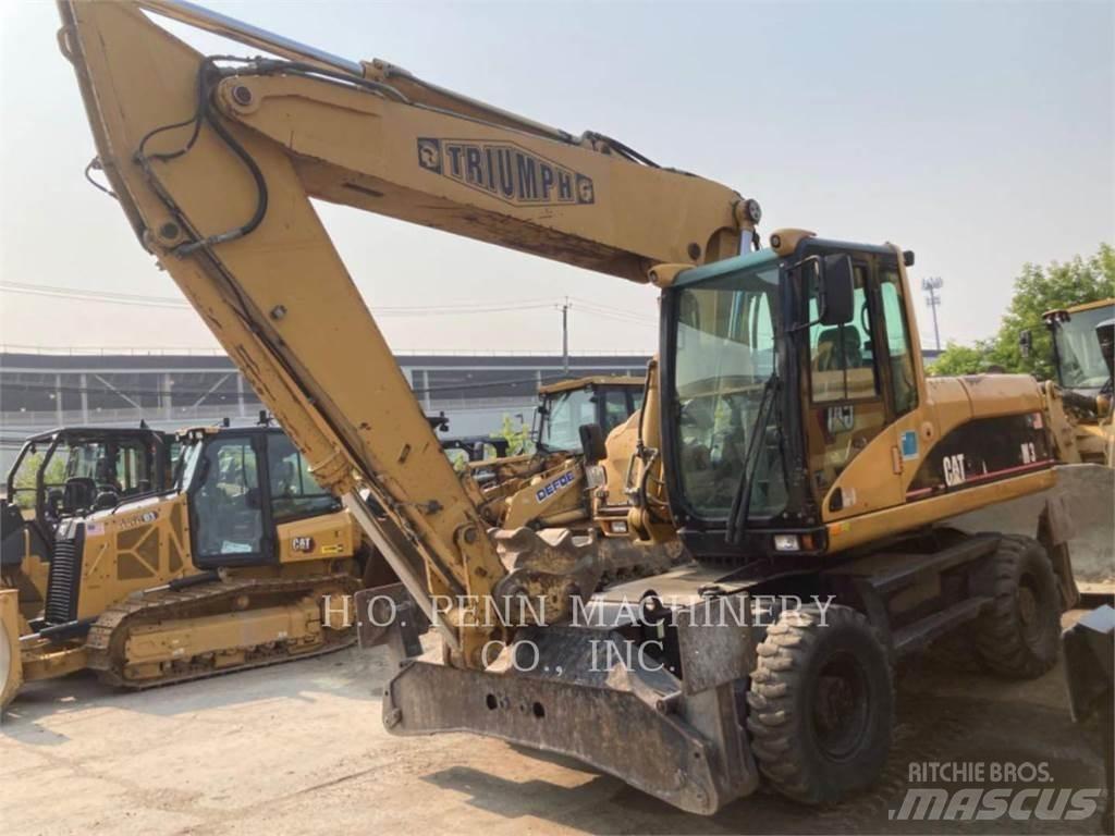 CAT M322C Hjulgravere