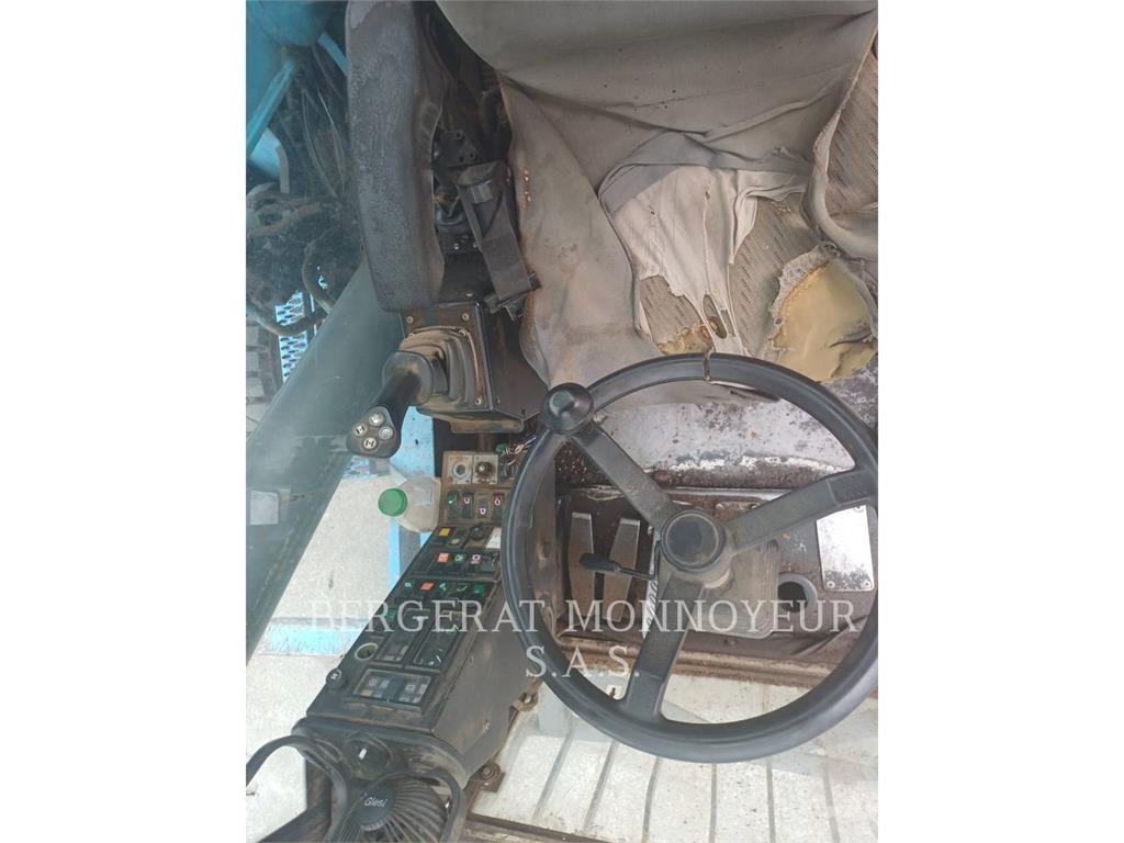 Fuchs MHL320 Hjulgravere