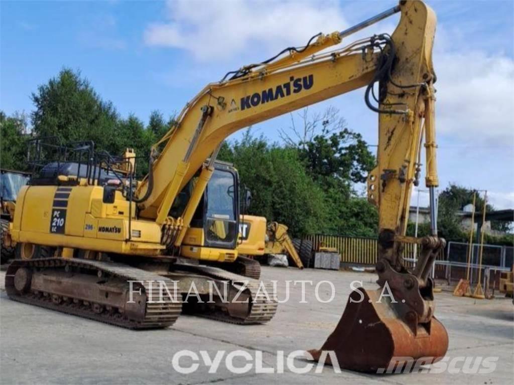 Komatsu PC210 Beltegraver