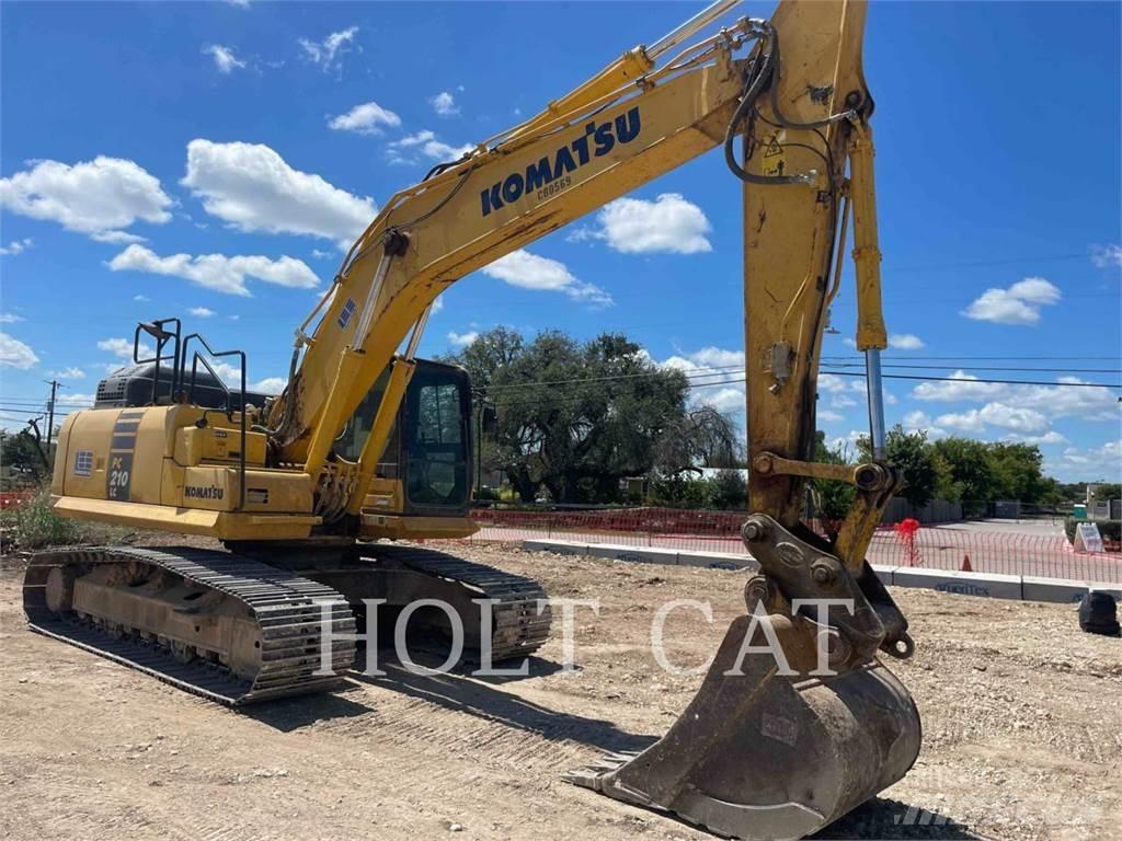 Komatsu PC210LC-11 Beltegraver