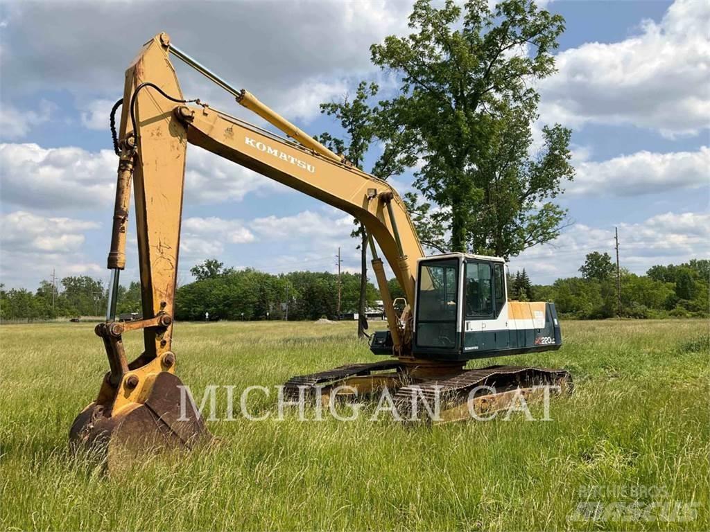 Komatsu PC220 Beltegraver