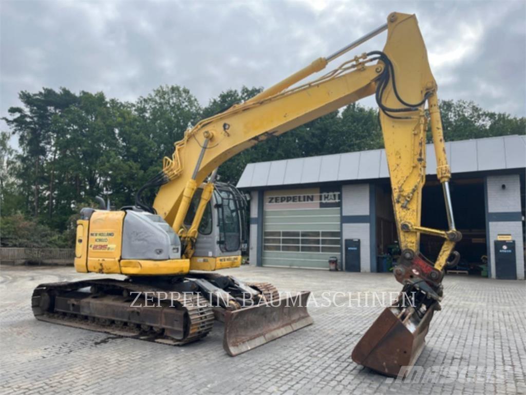 New Holland E235 Beltegraver