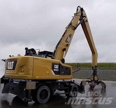 CAT MH3024 Gravemaskiner for avfallshåndtering
