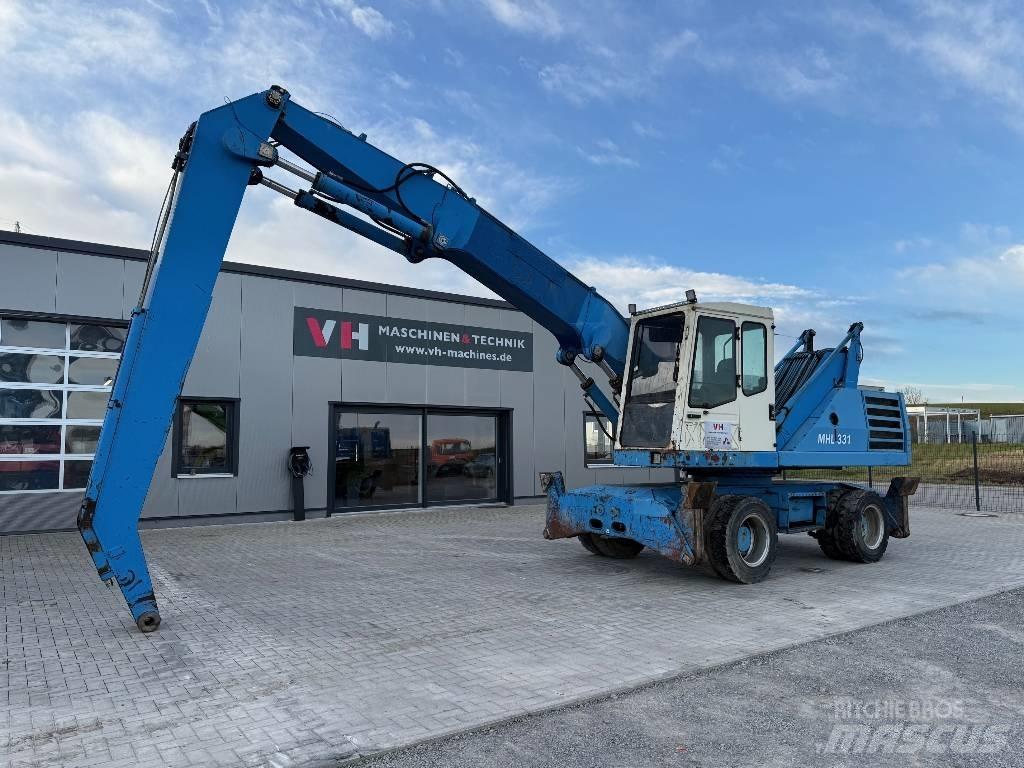 Fuchs MHL 331 Gravemaskiner for avfallshåndtering