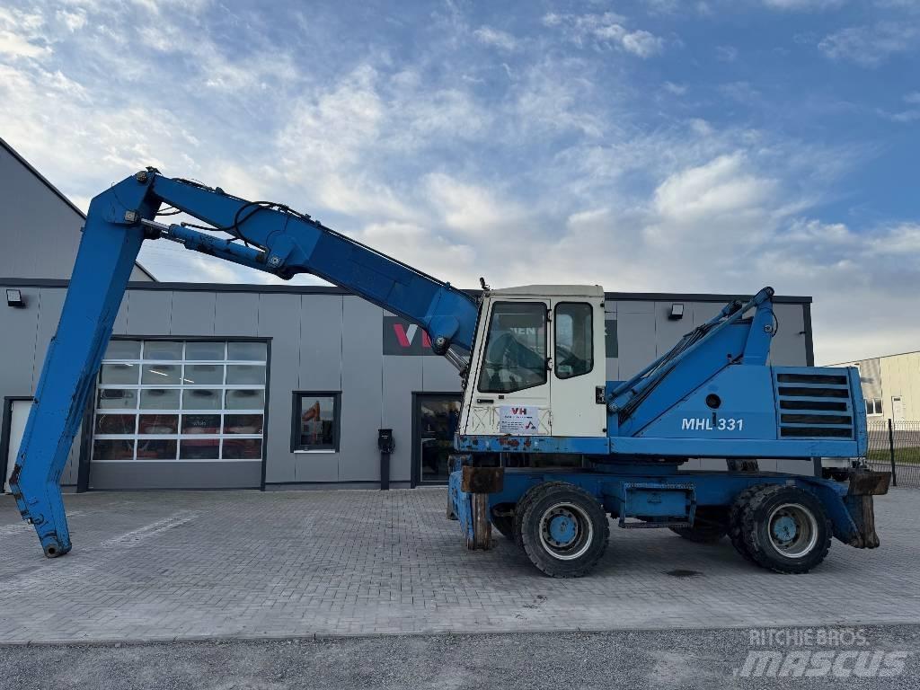 Fuchs MHL 331 Gravemaskiner for avfallshåndtering