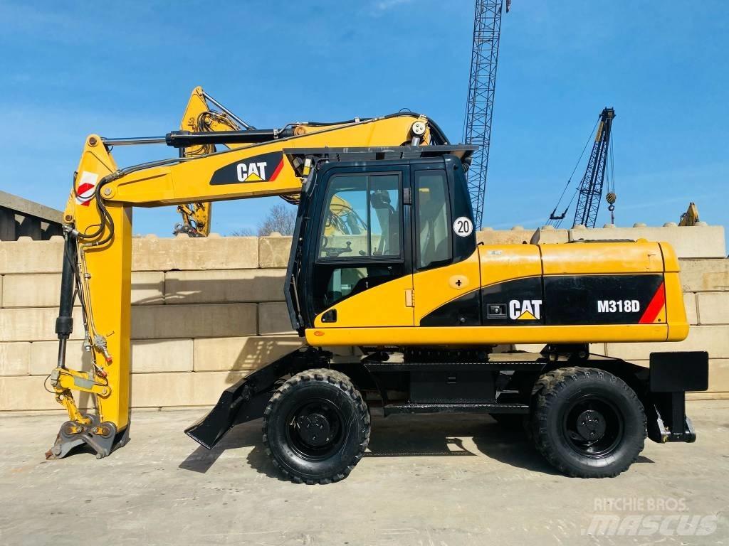 CAT M 318 D Hjulgravere