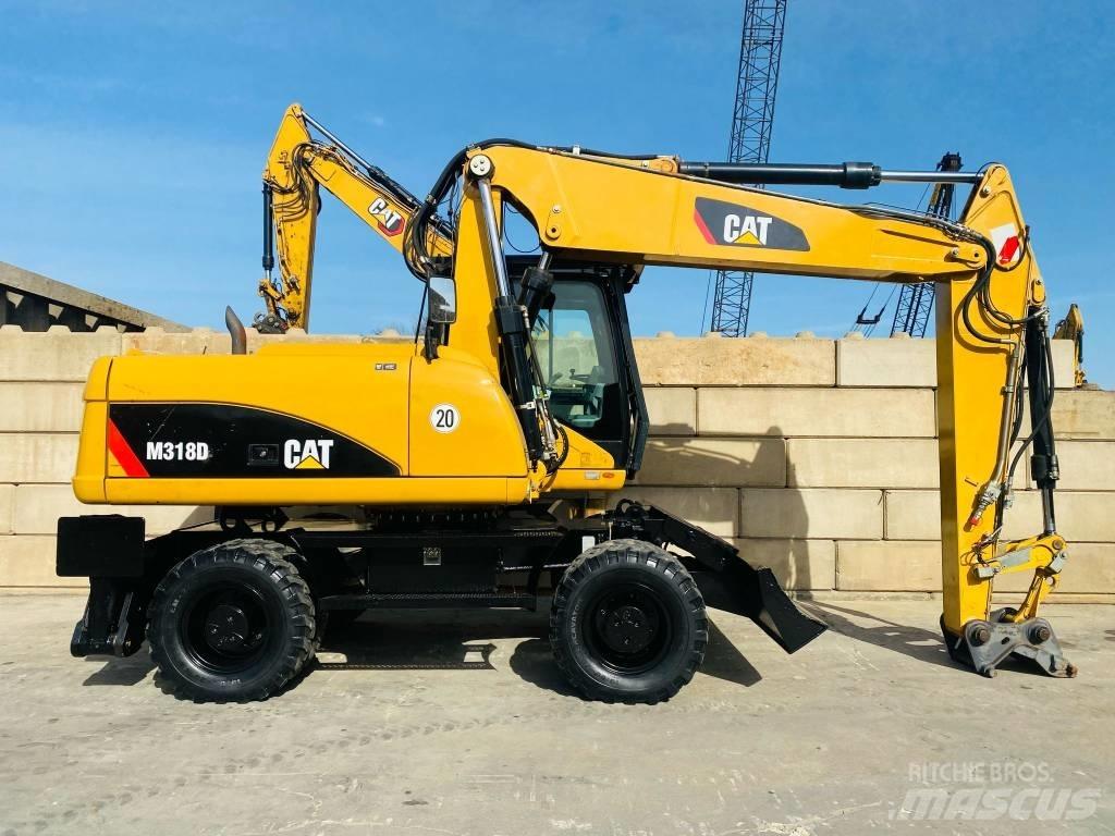 CAT M 318 D Hjulgravere