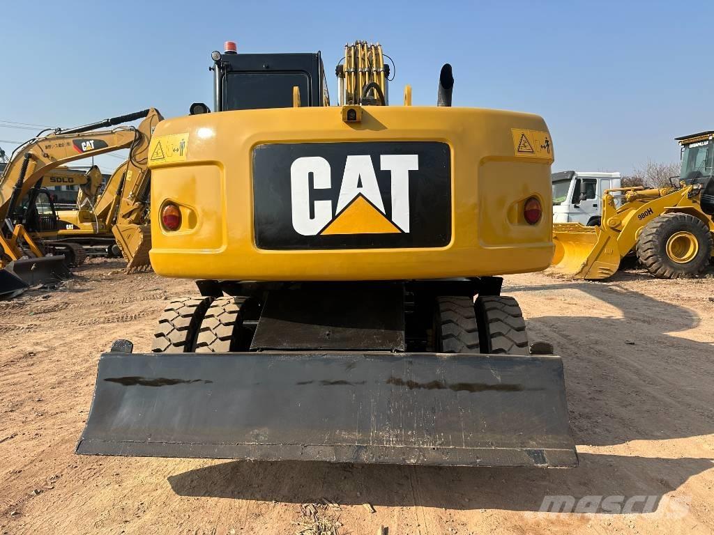 CAT M 320D Hjulgravere