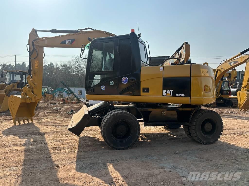 CAT M 320D Hjulgravere