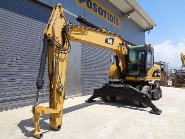 CAT M 318 D Hjulgravere