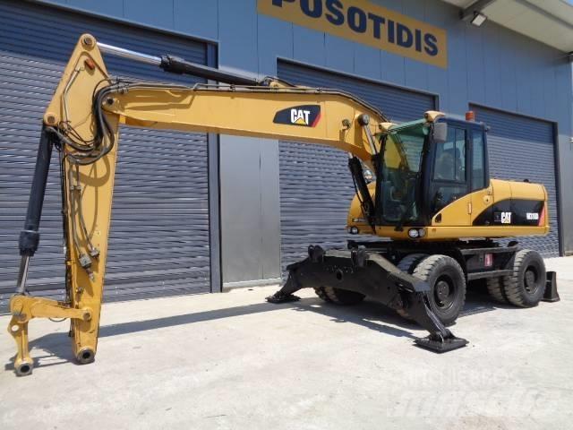CAT M 318 D Hjulgravere